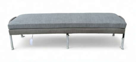 A Holly Hunt dining bench - of rectangular form with grey fabric cushion above a faux suede