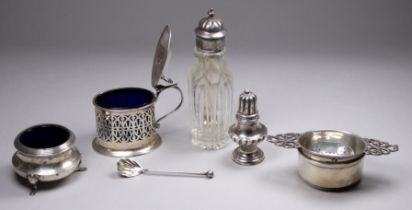 A silver tea strainer with cup - Birmingham 1938, Israel Sigmund Greenberg & Co, with pierced lug