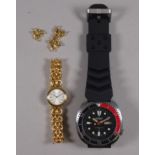 A Seiko gentleman's automatic divers wristwatch - the black dial set out with batons and dots and