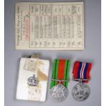 A WWII Defence medal - together with a George VI war medal, with original Certificate of Issue and