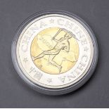 A 2008 Beijing Olympics commemorative bi-metallic coin.