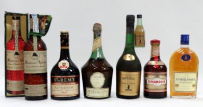 A bottle of St Remy brandy - together with a half bottle of Courvoisier cognac, a bottle of Sandeman