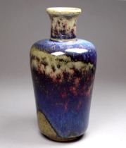 A Ruskin Pottery high-fired stoneware vase - of shouldered cylindrical form with narrow neck,