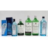 A bottle of Gordon's gin - 1 litre, together with another similar, a litre bottle of Bombay Sapphire