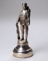 A silver model of a soldier in the Gurkha Regiment - on a stepped circular base, London 1924,