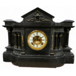 A late 19th century black marble portico mantle clock - with a Brocart movement, the cream chapter