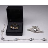 A marcasite bracelet - together with a vermeil and moonstone set ring and a small length of