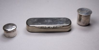 A silver travelling communion wafer holder - with gilded interior, height 2.5cm, a small silver
