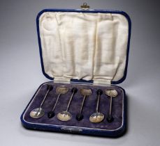 A set of six silver coffee bean spoons - Birmingham 1928, Robert Pringle & Sons, cased.