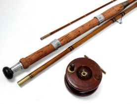 An early 20th century cane fishing rod - three sections with black whipping, together with a