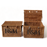 A pair of Fortnum & Mason wicker hampers, each with stencilled logo, each length 57cm, depth 38cm,