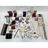 A quantity of costume jewellery - including silver items.