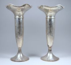 A pair of silver stem vases - Sheffield 1997, Walker and Hall, with scalloped rims and raised on