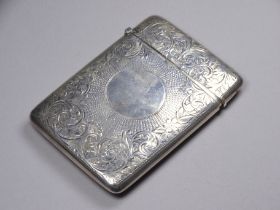 A silver card case - Brimingham 1905, Joseph Gloster, rectangular engraved with basket work and