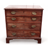 A George III mahogany chest of drawers - the rectangular top above an arrangement of four