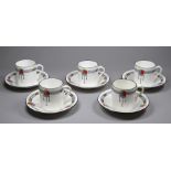 Five early 20th century Shelley coffee cans and saucers - with Art Nouveau decoration.