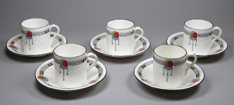 Five early 20th century Shelley coffee cans and saucers - with Art Nouveau decoration.