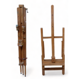 A beech artist's easel - of tripod form, together with another easel. (2)