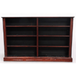 A Regency rosewood open bookcase - with a white marble top above two divisions with adjustable