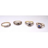 A 9ct gold sapphire and diamond ring - size M, together with three further 9ct gold dress rings,