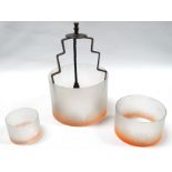 An Art Deco style hanging ceiling lamp - of three graduated graded orange opaque glass rings