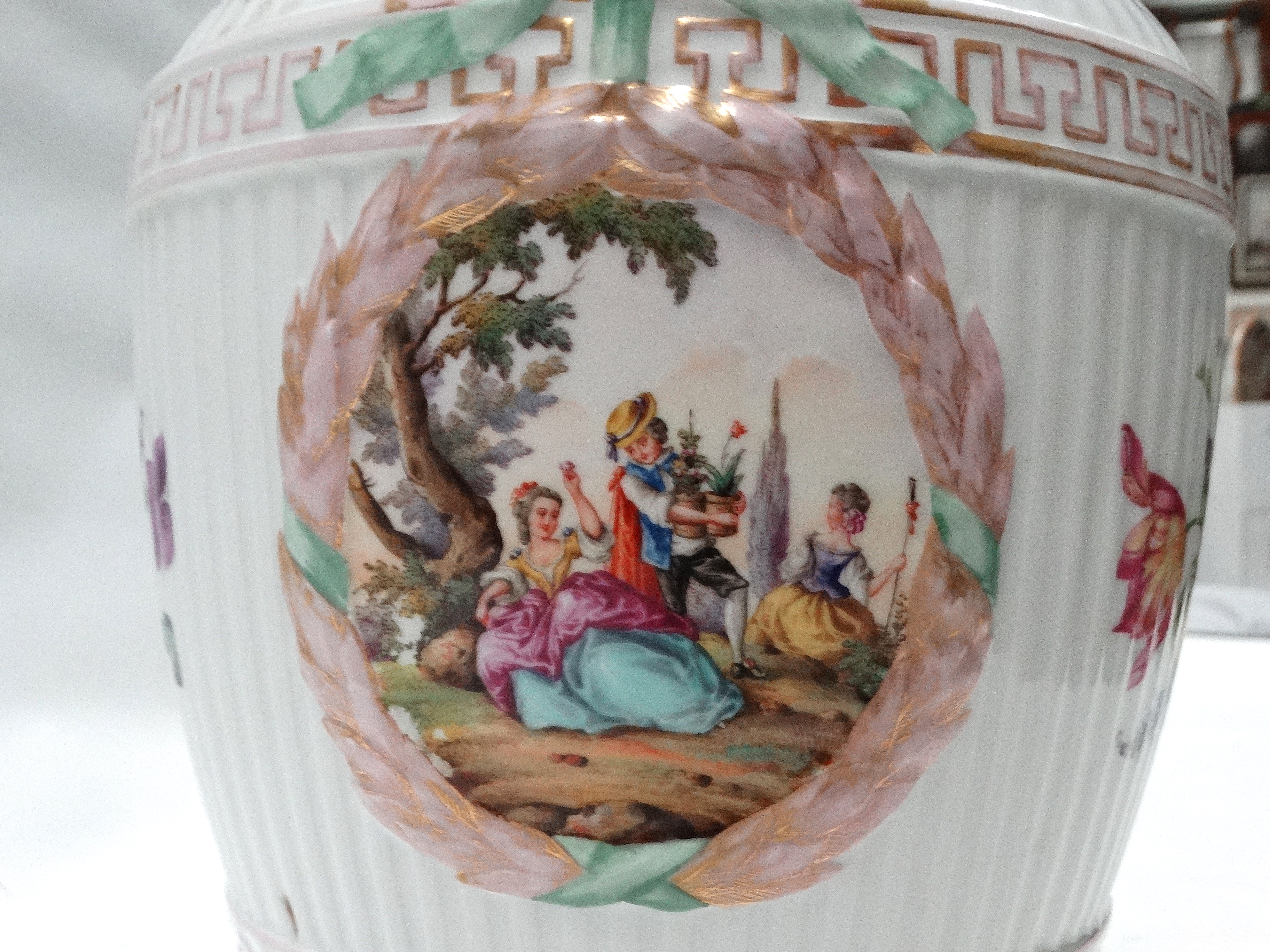 An early 20th century Meissen vase and cover - decorated with floral sprigs and vignettes of - Image 5 of 6