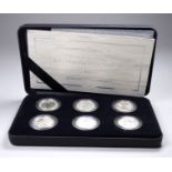 A 2007 Britannia 20th Anniversary silver proof £1 coin collection - cased, with certificate of