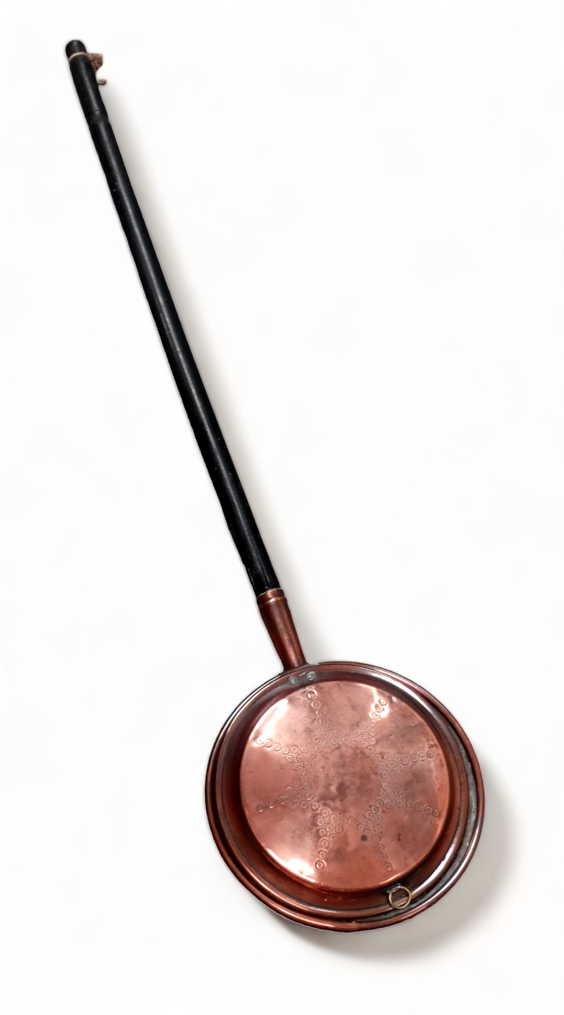 A Victorian copper warming pan - the cover with punched star decoration, length 115cm.