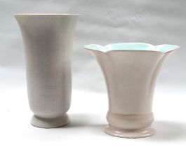 A mid 20th century Poole Pottery trumpet shaped vase - mottled grey with a pink interior, height