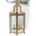 A Georgian style brass hexagonal hall lantern - height 83cm.