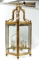 A Georgian style brass hexagonal hall lantern - height 83cm.