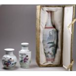 A 20th century Chinese narrow baluster shaped vase - decorated with a mountainous landscape scene,