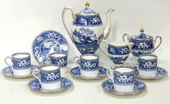 A Wedgwood coffee service for six - blue and white decorated with bucolic scenes, comprising six