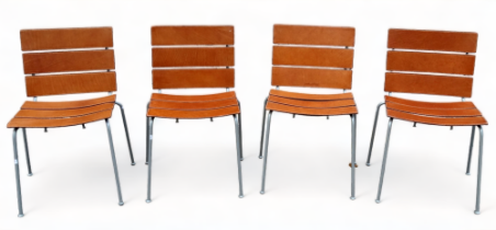 A set of four Italian leather upholstered chairs by Fasem - of tan webs and grey painted tubular