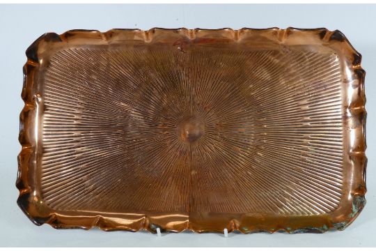 An early 20th century rectangular copper tray - with twin brass handles and decorated with a sun- - Image 2 of 4