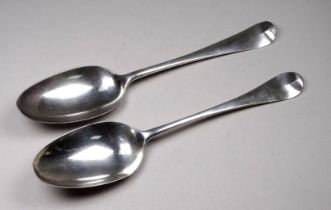 A Georgian silver dessert spoon - London 1762, with foliate engraving to the reverse of bowl,