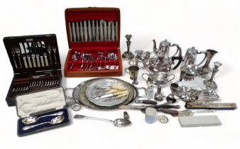 A quantity of silver plated wares - to include two canteens of flatware, two Mappin & Webb hot water
