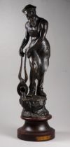 An early 20th century bronzed spelter figure - 'Le Fondeur', raised on a circular base, height