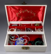 A small quantity of costume jewellery - including a floral enamel brooch and sundry necklaces (qty)