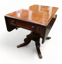 A George IV mahogany pedestal Pembroke table - the rectangular top above a pair of opposing