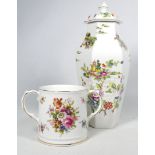 A Royal Worcester twin handle mug - decorated with floral sprays, 10cm high, together with a Crown