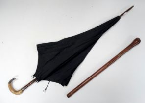 An early 20th century umbrella with silver mounts - London 1905, by Fox & Sons, the horn hook handle