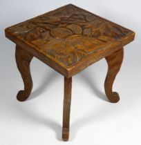 A Liberty & Co. 'Japanese' carved hardwood occasional table - the square top with foliate decoration