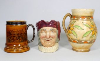 Royal Doulton Simon the Cellarer jug - 16cm high, together with a treacle glazed Jamaca Inn mug