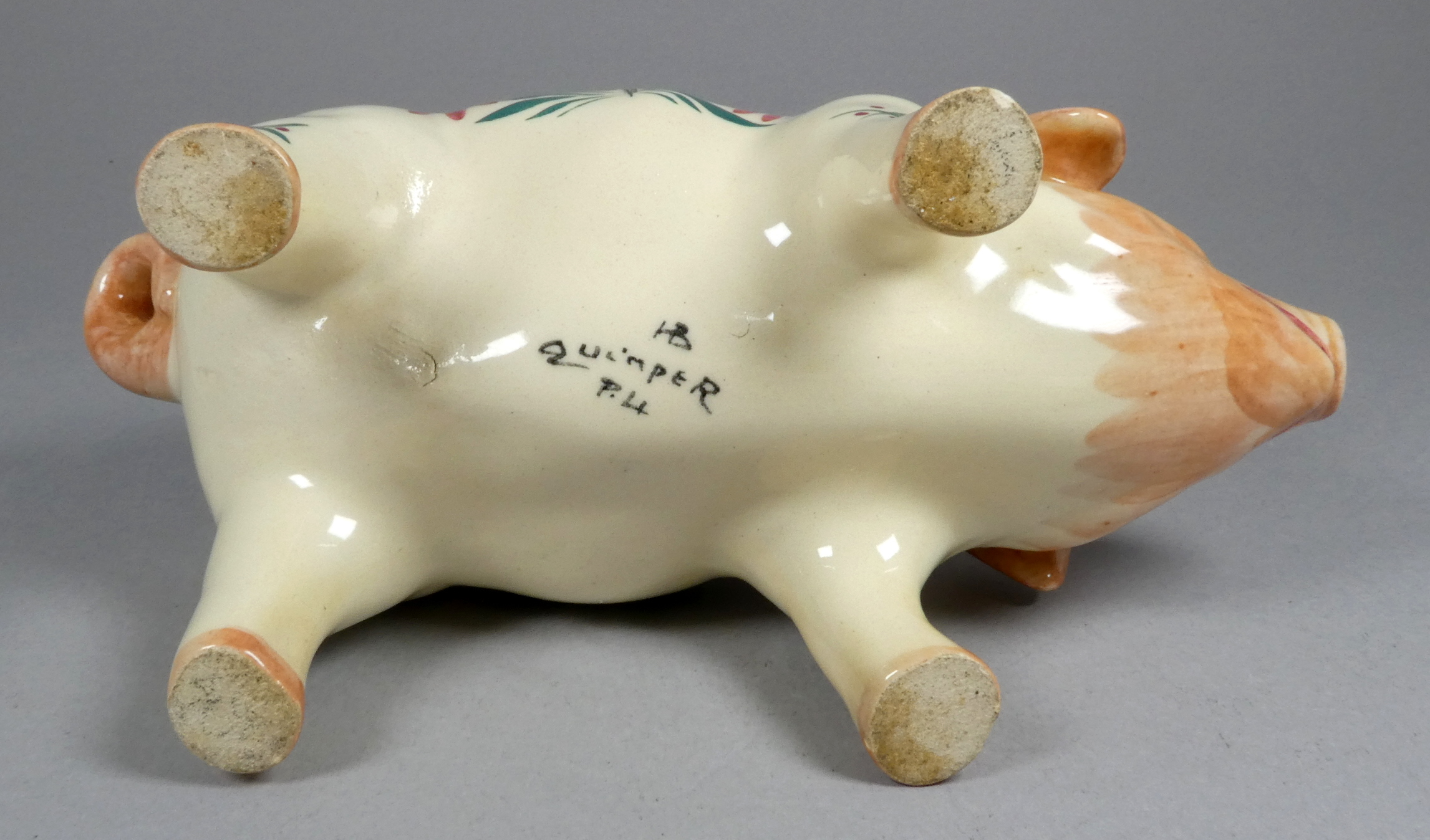 A Quimper pottery piggy bank - decorated with flowers, 21cm wide, together with another larger - Image 4 of 8