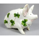 A Wemyss ware pottery pig - with clover leaf decoration, impressed marks to base include 'R.H.&
