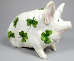 A Wemyss ware pottery pig - with clover leaf decoration, impressed marks to base include 'R.H.&