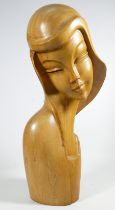 A carved hardwood bust of an elegant woman - height 46cm.