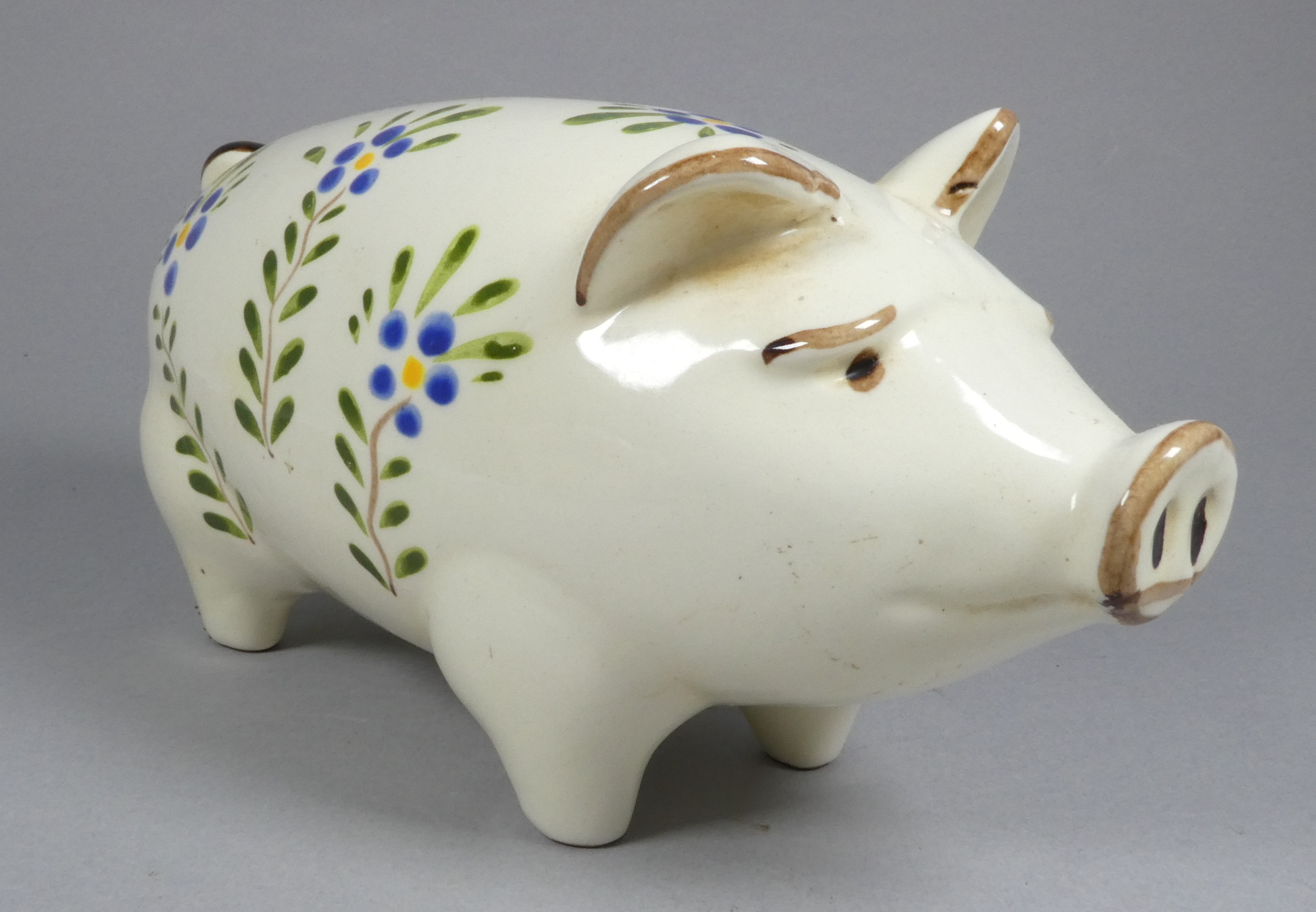 A Quimper pottery piggy bank - decorated with flowers, 21cm wide, together with another larger - Image 5 of 8