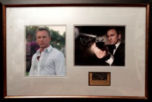 Daniel Craig signed photograph as James Bond - together with another, framed as one with certificate